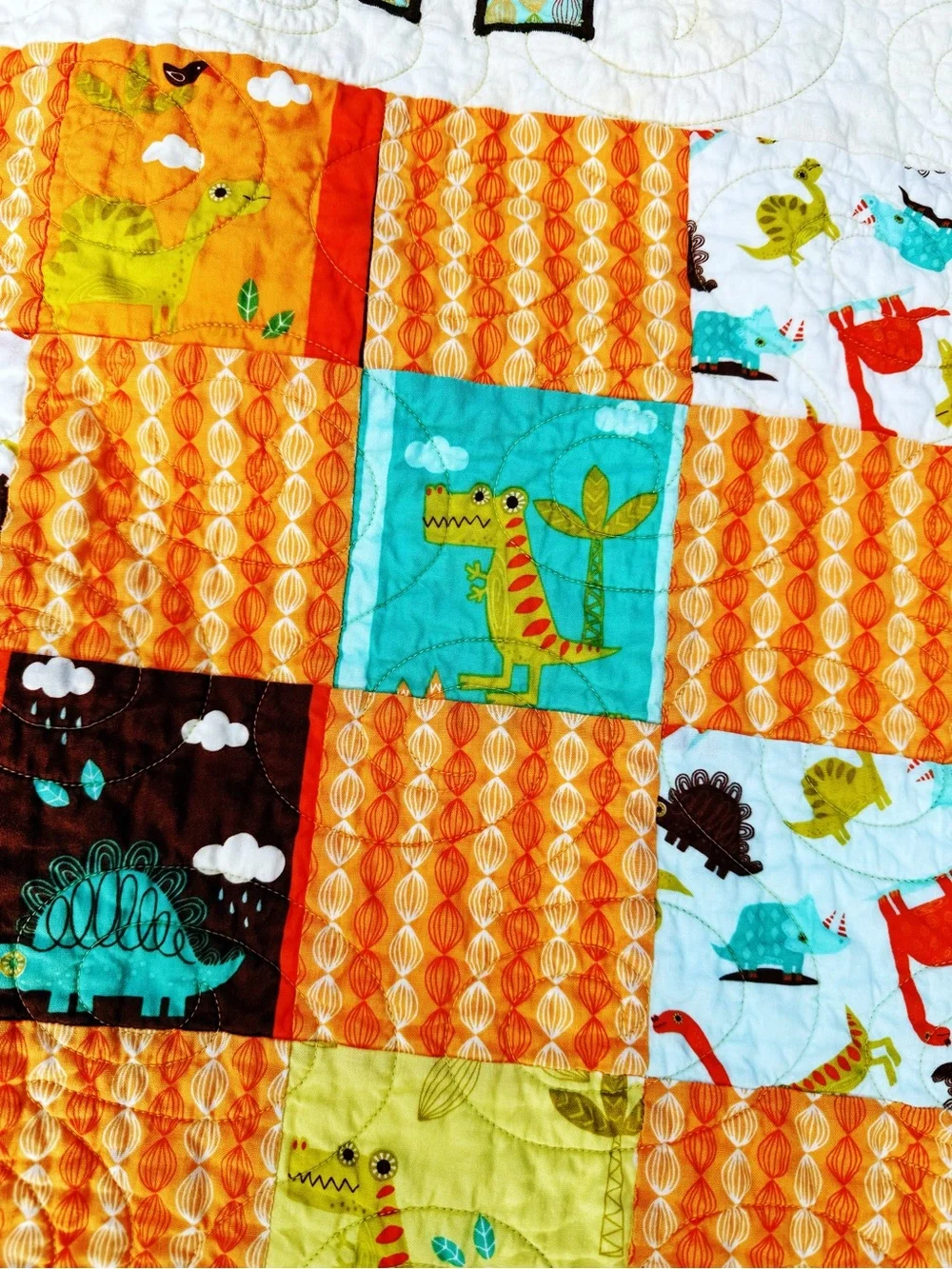 Playful Dino Patchwork Handmade Baby Quilt - Aqua & Orange